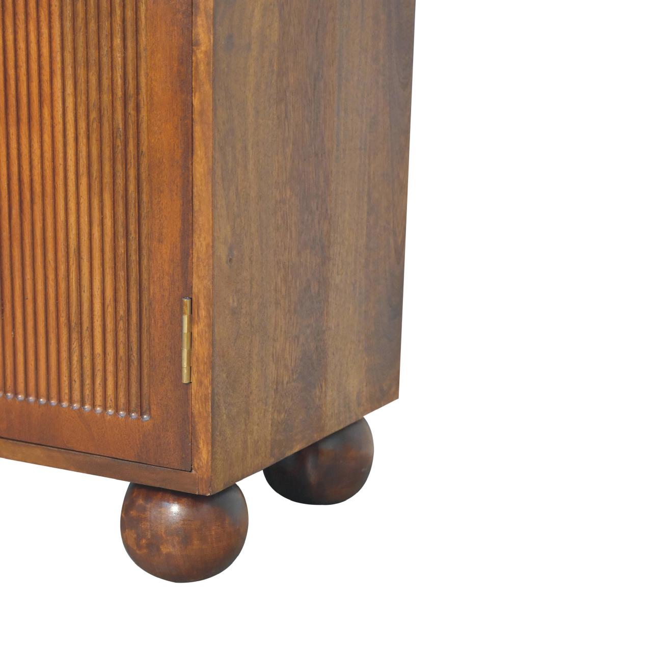 Vintage wooden cabinet on spherical feet