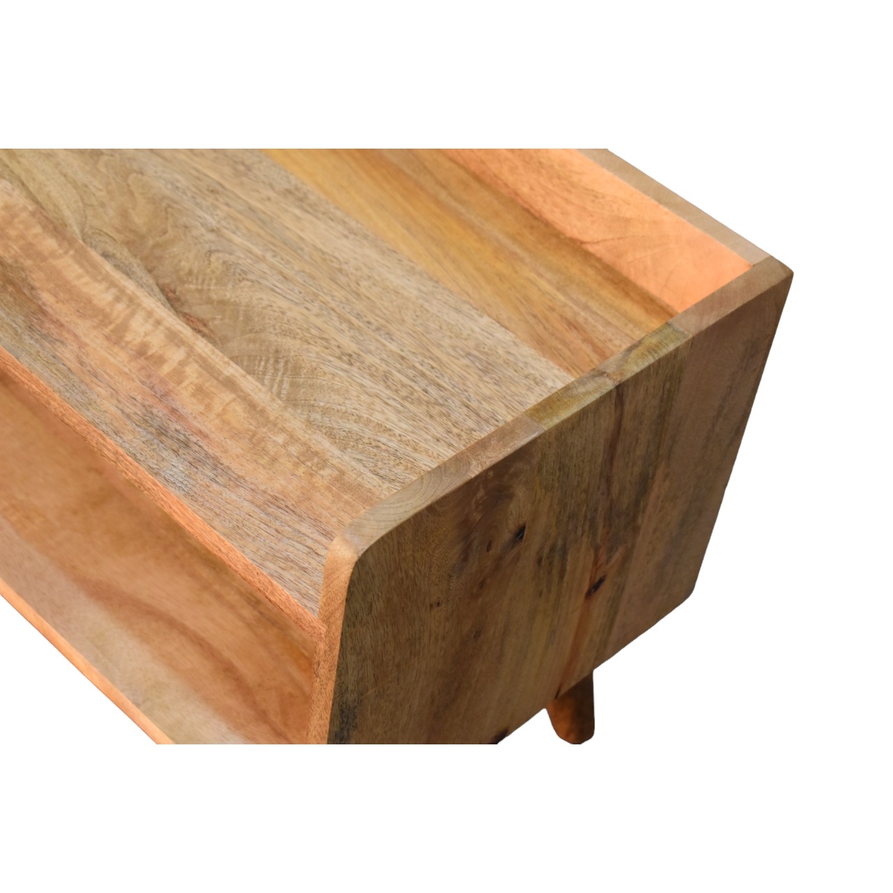 Solid wooden cutting board corner detail.