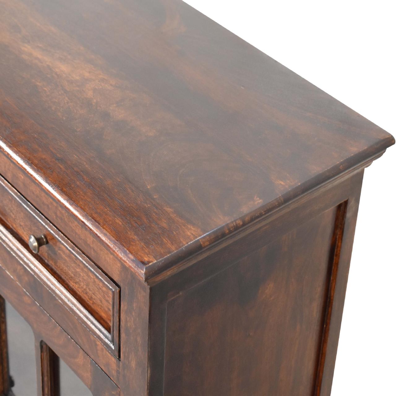 Antique wooden writing desk, close-up view.